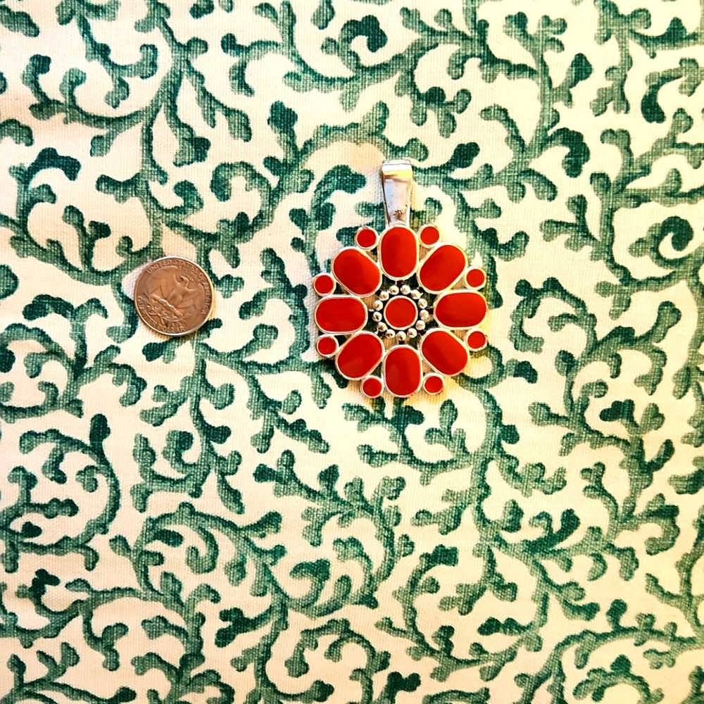 Reversible red and turquoise on silver pendant.